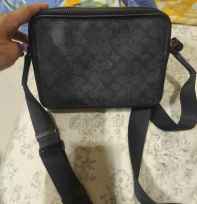Tas sling merk coach